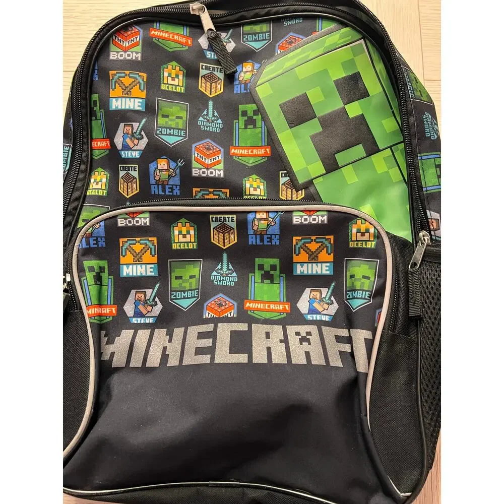 Minecraft backpack w/ 2 zippered sections. Measures 11